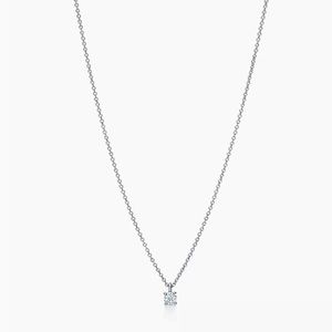 Tiffany solitaire diamond pendant in platinum .17 carat